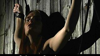 I feel so aroused as this redhead slut gets bondaged in the barn and roughly sex-tamed with intense passion.