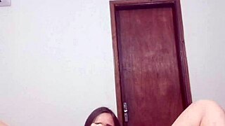 Solo girl rubs her pussy and clitoris before penetrating with a huge toy in homemade video