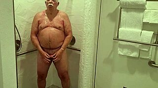 Grandpa's getting all steamy in the shower, showing off that mature exhibitionist vibe 😏