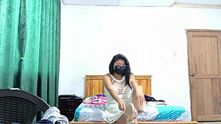 the busty executive chooses a white dress and then starts making sensual movements showing her beautiful figure