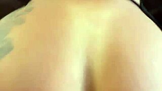 sultry tattooed brazilian milf fists her huge ass in black bodysuit closeup