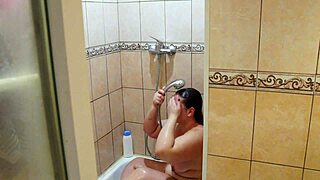 Home Cam Captures Chubby Milf Shower Shave of Big Wet Pussy