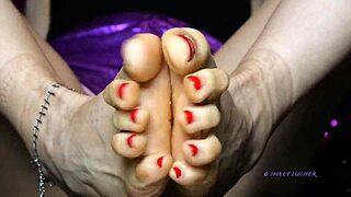 sweat-drenched petite mistress's small feet with red toenail polish demand total domination