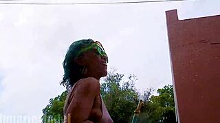 Check out this hairy latina flashing pussy and ass at carwash.