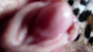 woman's big clit throbs through intense closeup orgasm