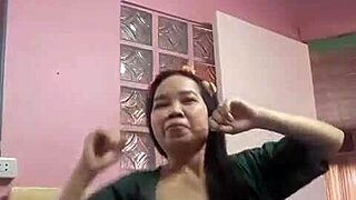 dancing asian doll twirls playfully in homemade amateur clip