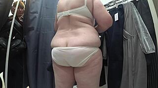 Plump milf's juicy ass exposed in dressing room cam!