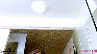 brunette babe glows up after steamy shower session