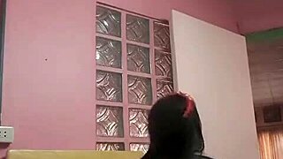 dancing asian doll twirls playfully in homemade amateur clip