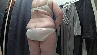 Plump milf's juicy ass exposed in dressing room cam!