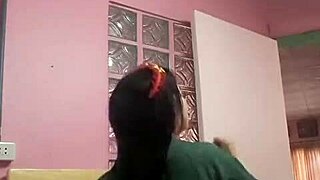 dancing asian doll twirls playfully in homemade amateur clip