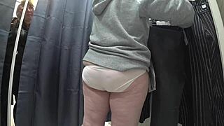 Plump milf's juicy ass exposed in dressing room cam!
