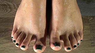 Cleaning Green-Nailed Feet Close Up