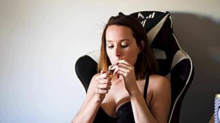 i'm staring at this busty brunette's black bra smoke...