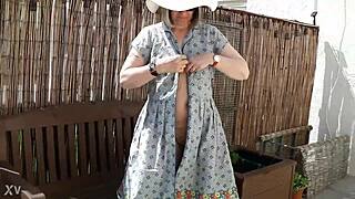 Who's that naughty girl stripping naked in garden?