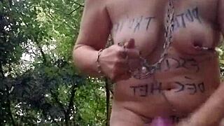 hey slave, chained in forest for humiliation and belt discipline outdoors