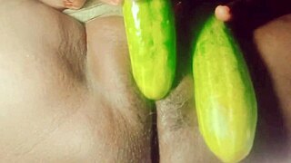 i'm that indian village chick stuffin cucumber deep in my wet pussy