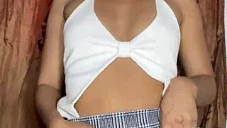 Petite innocent miniskirt babe secretly fingers her smooth young pussy on homemade webcam