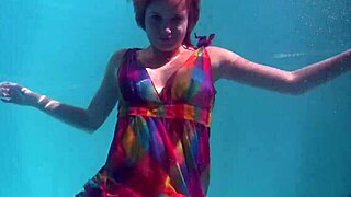 Redhead Nikita Vodorezova Strips Naked Fast Underwater