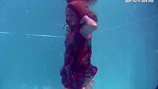 Redhead Nikita Vodorezova Strips Naked Fast Underwater