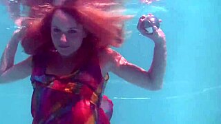 Redhead Nikita Vodorezova Strips Naked Fast Underwater