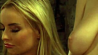 Curvy lesbian slave strips big natural tits for mistress bondage domination