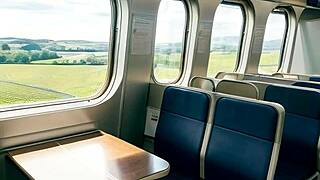 classy milf in leather skirt rides cock on public train