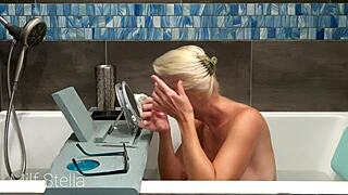 Bathing with milf stella e01 she shaves her smooth pussy