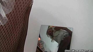 Grandma Isabel rips pantyhose over massive breasts