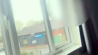 blondebunny8 spreads pussy by window teasing