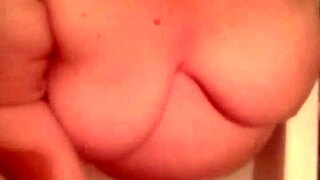 gf gives bathtub blowjob cum on big tits