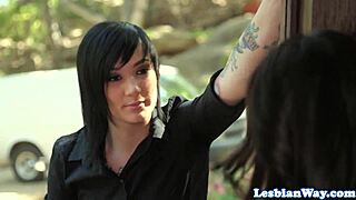 tattooed lesbian rams strapon deep in dyke babes pussy