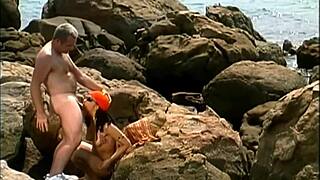 Mature Man Pounds Exotic Babe's Clit and Pussy on Seaside Stones Cowgirl Style