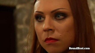 dominant lesbian mistress watches bound slaves whipped punished in garage