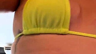 transparent thong bikini at guarujá beach gym shows pierced wet pussy to excited staring guys