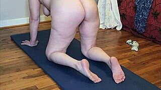 curvy mature babe stretches big tits in steamy naked yoga flow