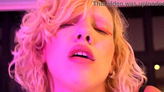 Busty tattooed blonde pornstar sneaks backstage for sloppy pov blowjob and foot handjob.