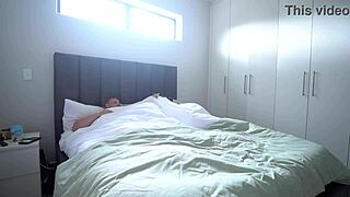 stepmom sneaks in while stepson pretends to sleep, teasing his cock wetly