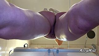 Pretty teen babe spreads shaved pussy lips up close solo