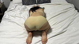 curvy japanese babe stretches big ass during steamy bed workout session