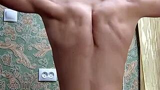 flexible skinny bodybuilder pounds hard post-study workout