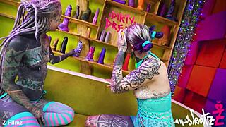 two tattooed goth lesbians gape asses with huge toys. real anal orgasms