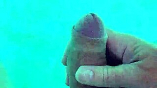 Guy strokes cock solo naked poolside handjob masturbation voyeur tease in public water 3