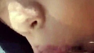 She kneels sucking cock close up in raw detail.