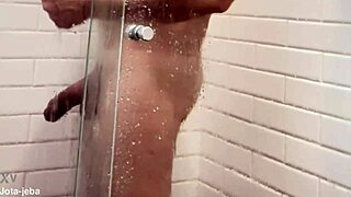endowed stud plays huge cock bath fun!
