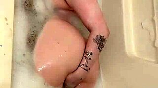 chubby oiled babe's huge tits and pussy lips erupt in tub orgasms