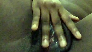 Bold ebony teen spreads big pussy lips in solo masturbation