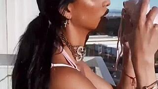 Teasing in pink lingerie drives me wild with sexy latina curves on display.