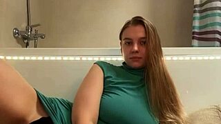 Horny Student Fingers Herself in Bathroom Orgasm