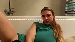 Horny Student Fingers Herself in Bathroom Orgasm